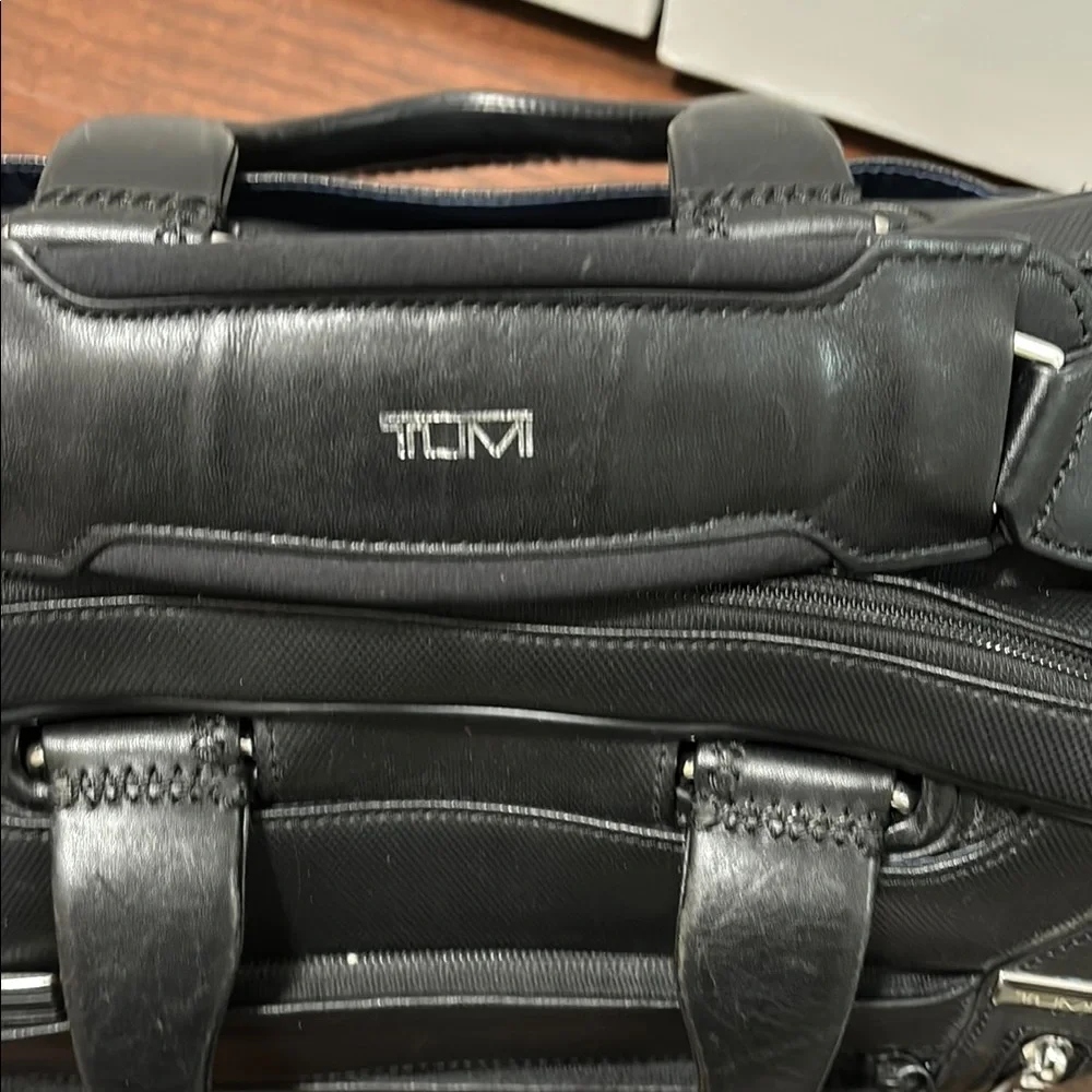 Tumi Black Professional Briefcase with Durable Design